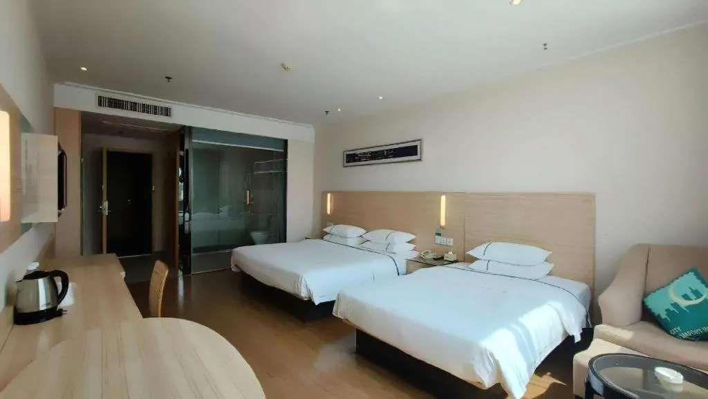 Bed in City Comfort Inn Jingzhou Ancient City Taiyue Road