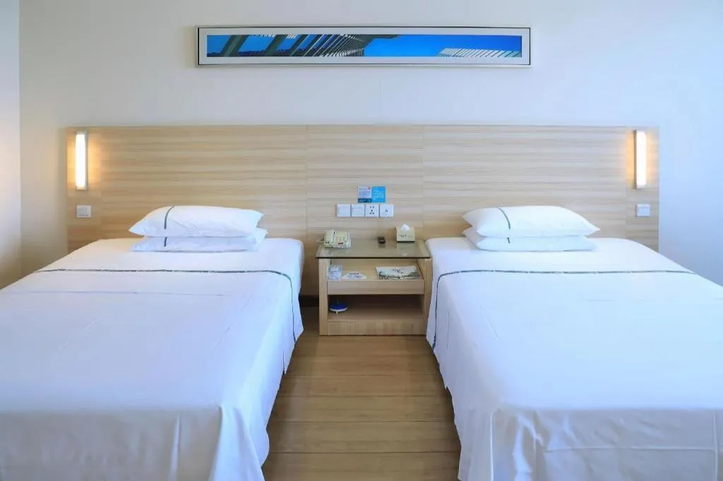 Bed in City Comfort Inn Jingzhou Ancient City Taiyue Road