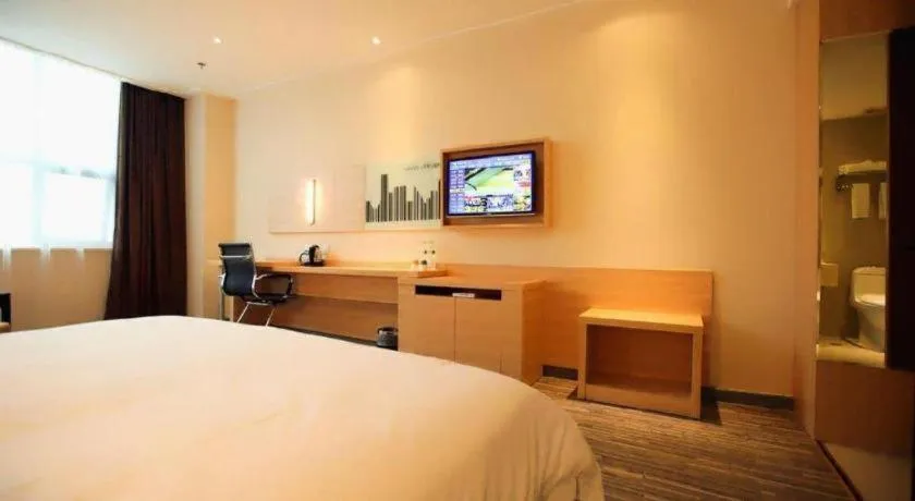 Bed in City Comfort Inn Jingzhou Ancient City Taiyue Road