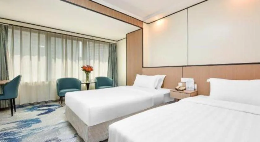 Bed in Dalian Bohai Pearl Hotel