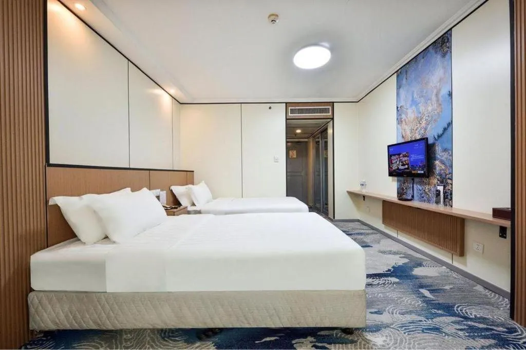 Bed in Dalian Bohai Pearl Hotel