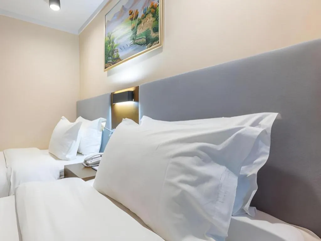 Bed in Dalian Bohai Pearl Hotel