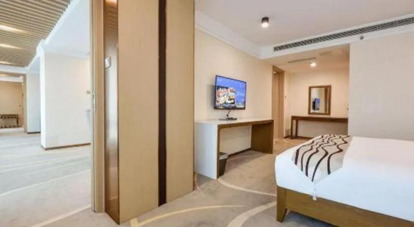 Bed in Dalian Bohai Pearl Hotel
