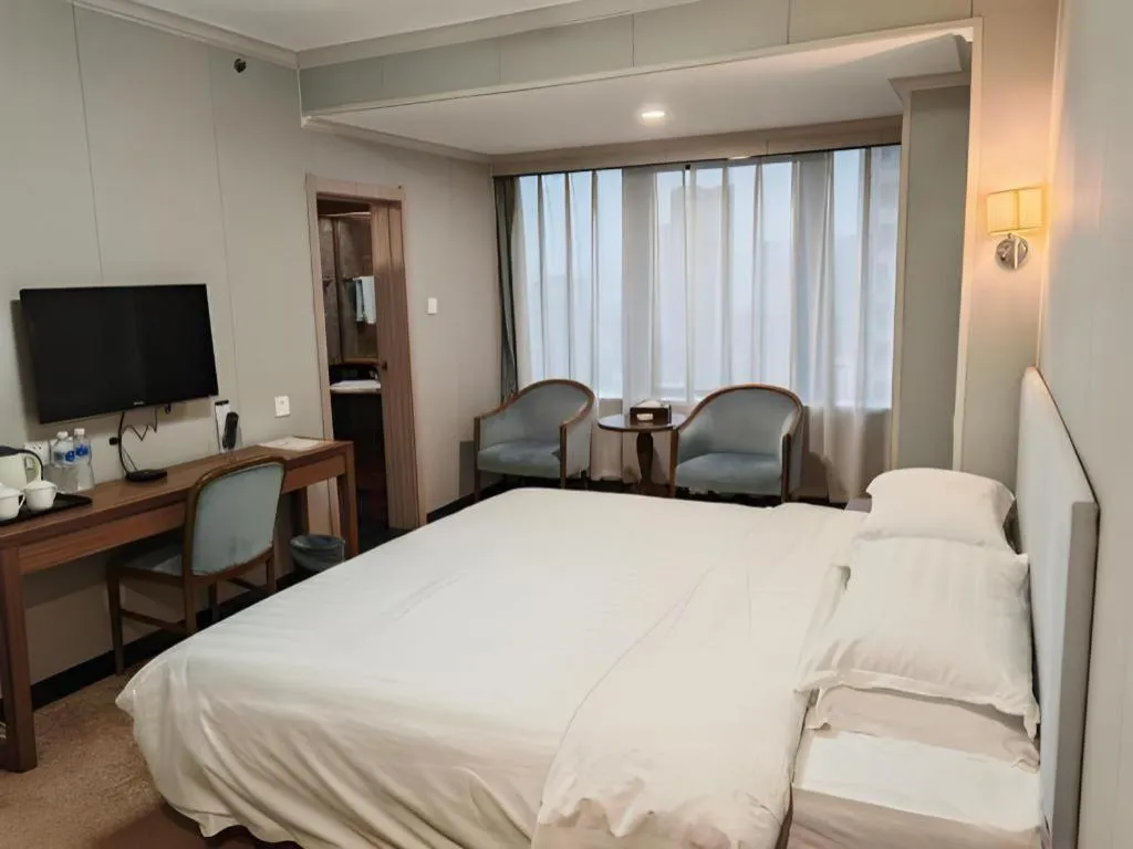 Bed in Dalian Bohai Pearl Hotel