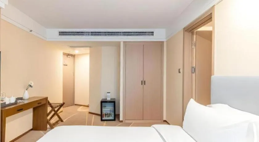 Bed in Dalian Bohai Pearl Hotel