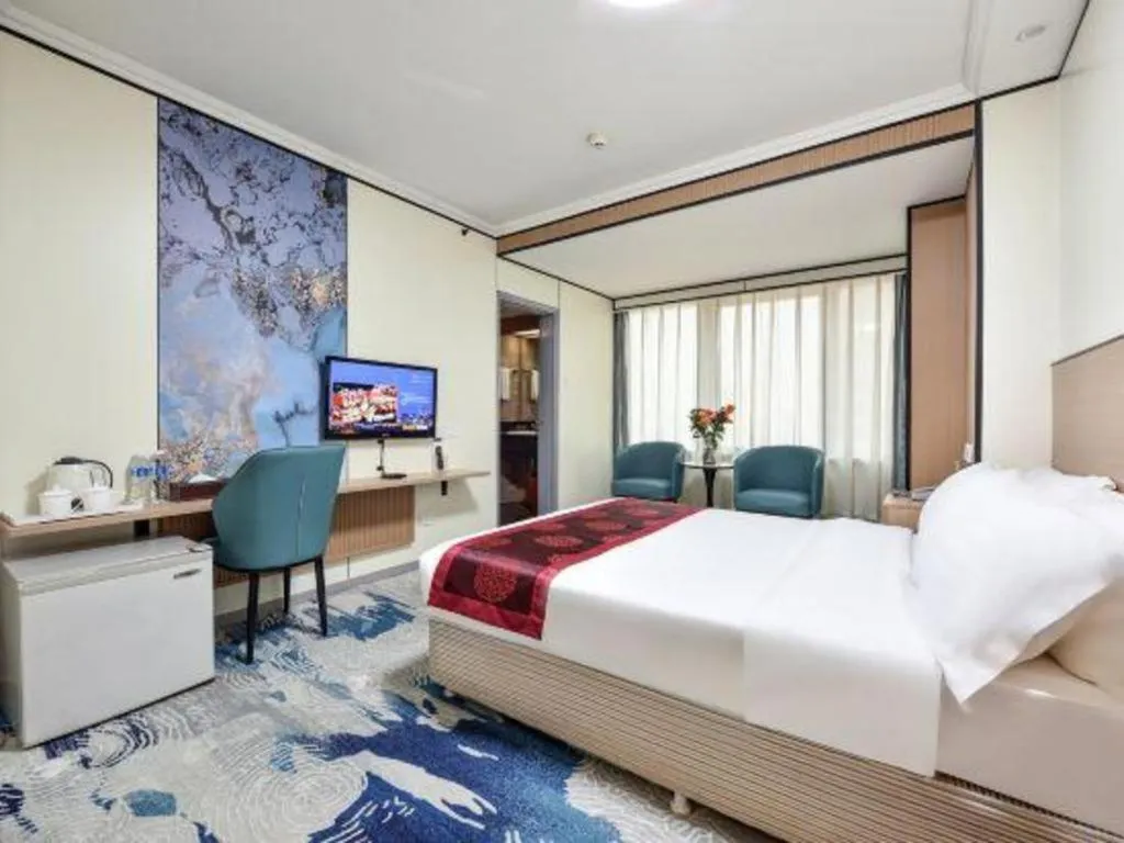 Bed in Dalian Bohai Pearl Hotel