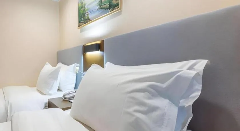 Bed in Dalian Bohai Pearl Hotel