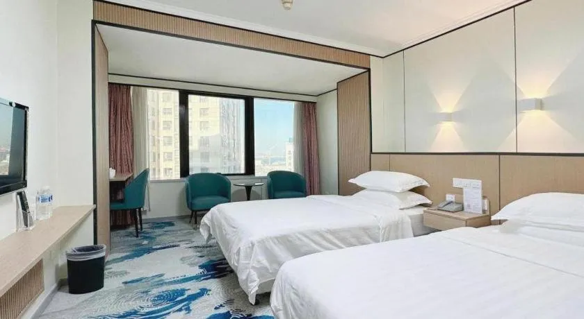 Bed in Dalian Bohai Pearl Hotel