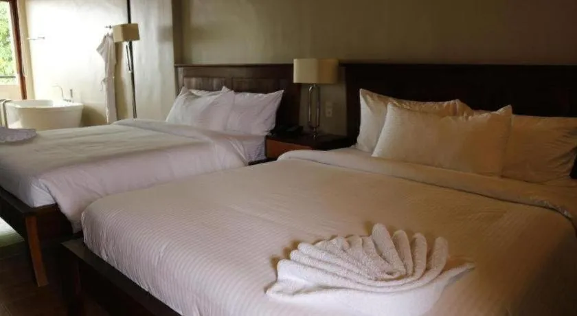 Bed in Bravo Resorts - Munting Paraiso