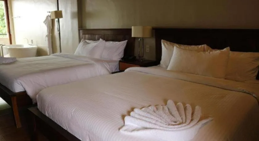 Bed in Bravo Resorts - Munting Paraiso