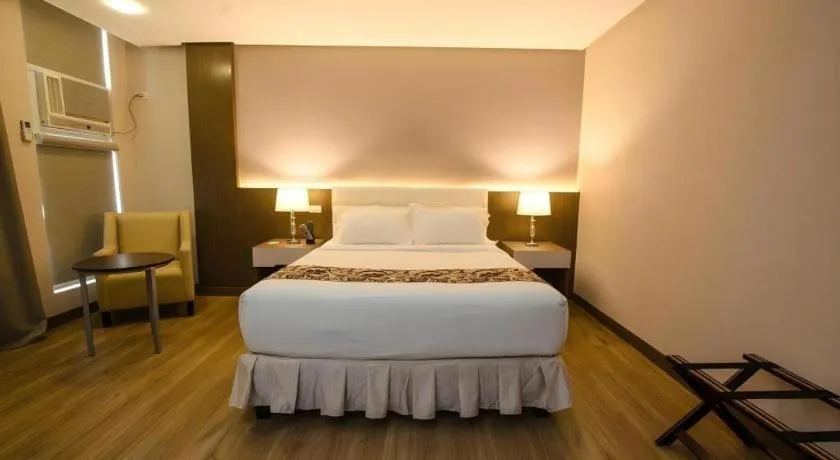 Bed in Oryza Hotel
