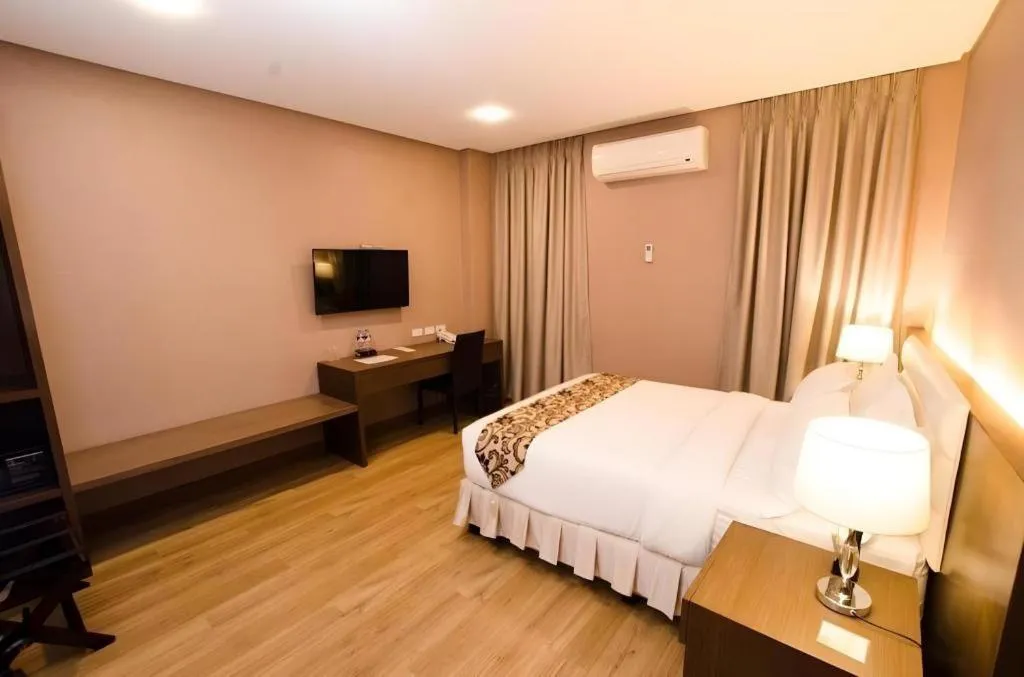 Bed in Oryza Hotel