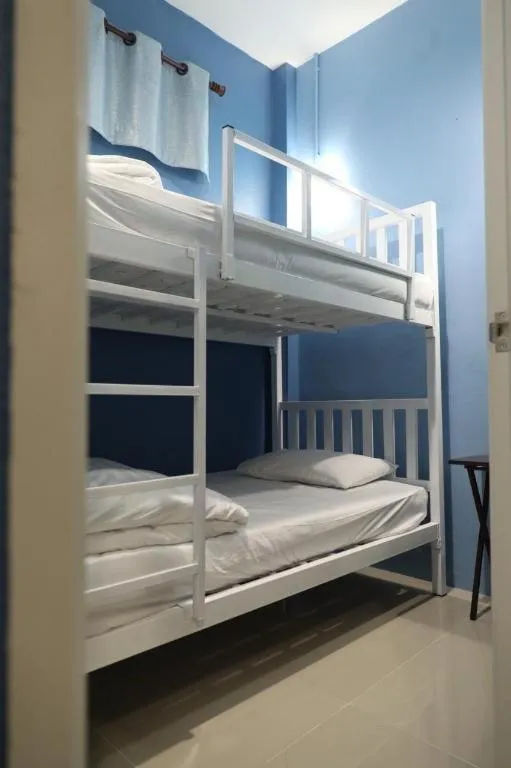 Bed in Rainbow Sky Hotel Samet