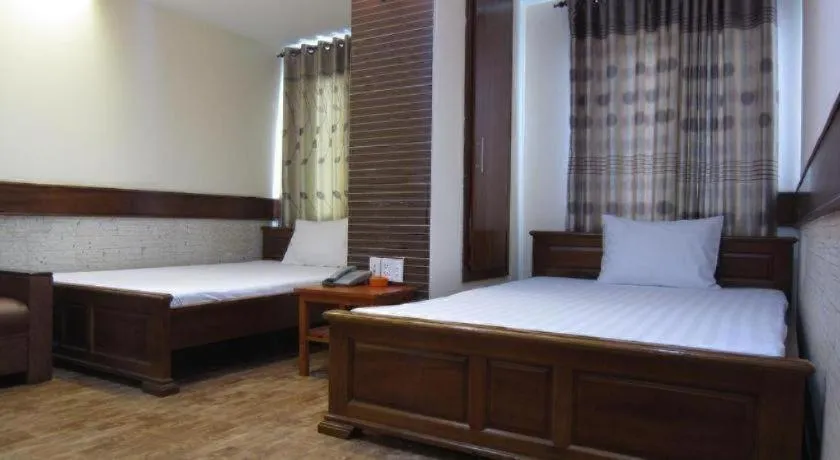 Bed in Melody Viet Hotel