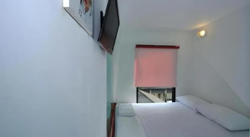 Bed in The Chilli Bangkok Hotel