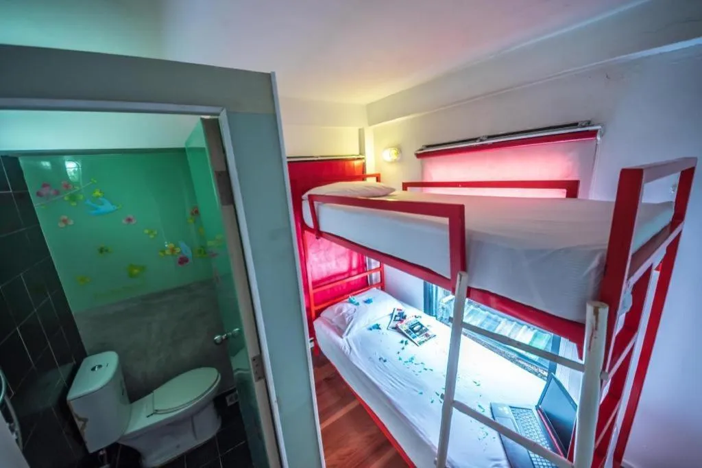 Bed in The Chilli Bangkok Hotel