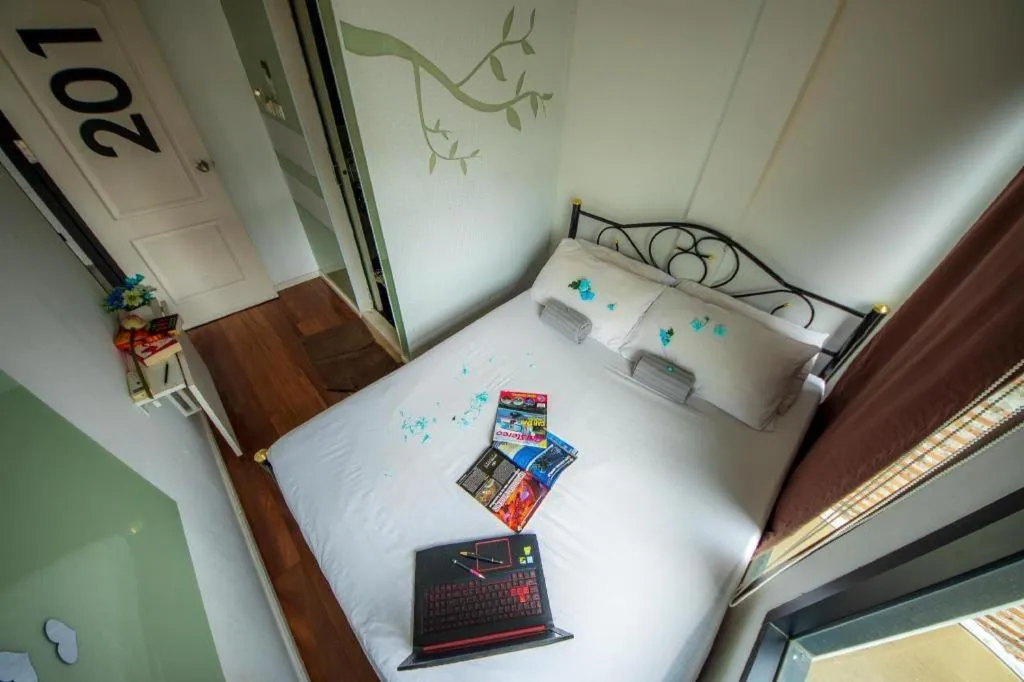 Bed in The Chilli Bangkok Hotel