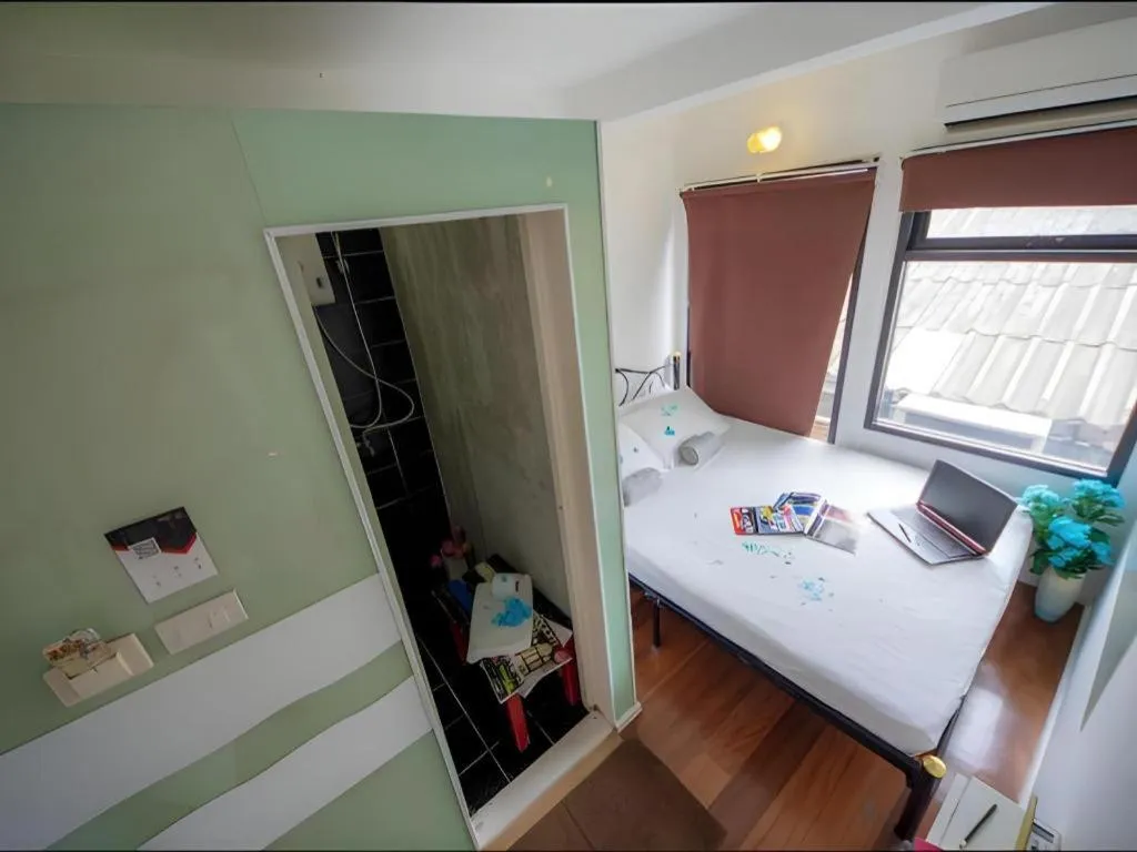 Bed in The Chilli Bangkok Hotel