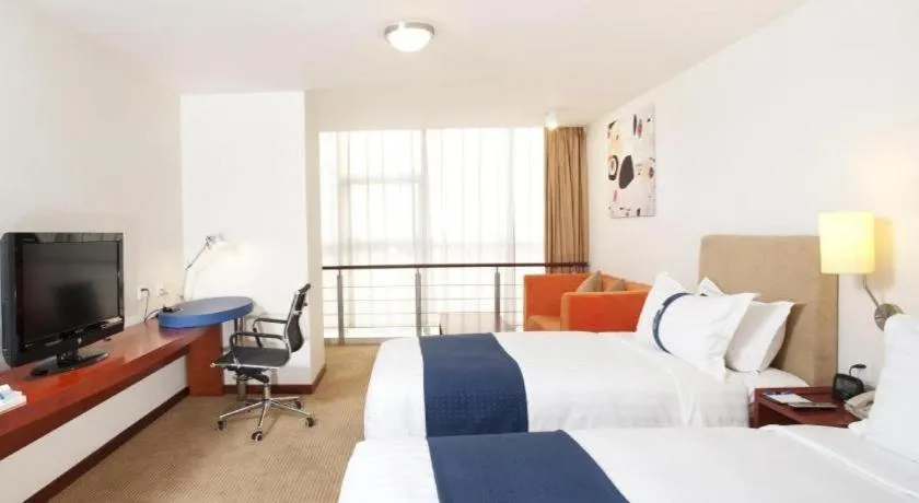 Bed in Holiday Inn Express Tianjin Dongli By IHG