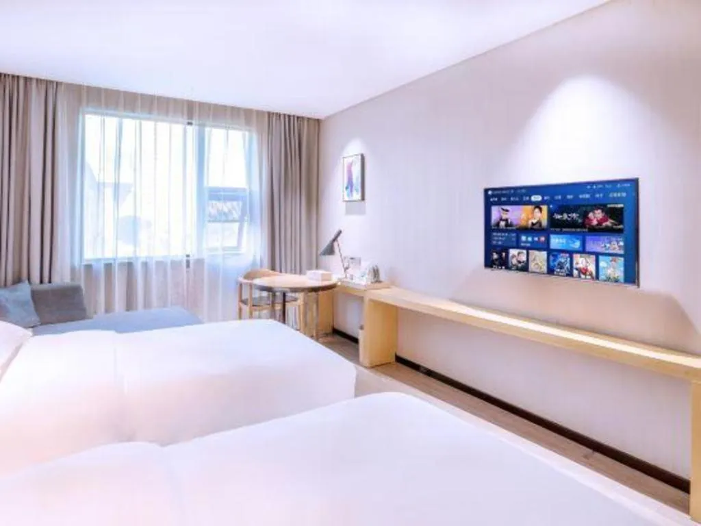 Bed in Echarm Hotel Nanning Nationalities Square Metro Station