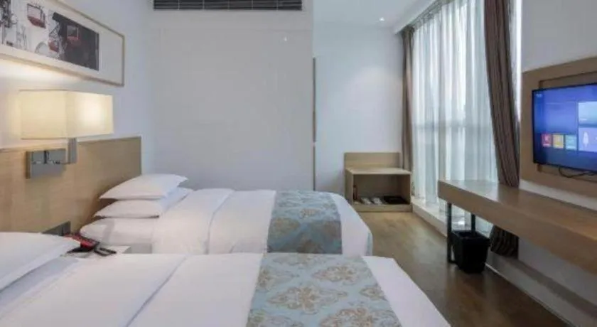 Bed in Ramada Encore by Wyndham Chongqing Yubei