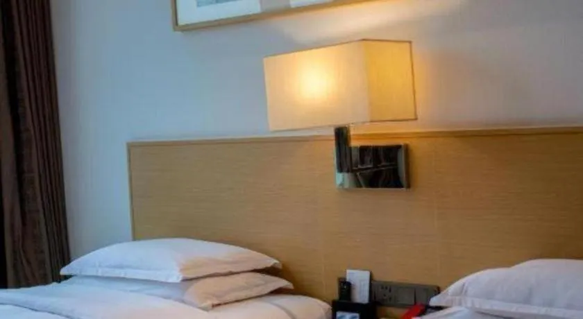 Bed in Ramada Encore by Wyndham Chongqing Yubei