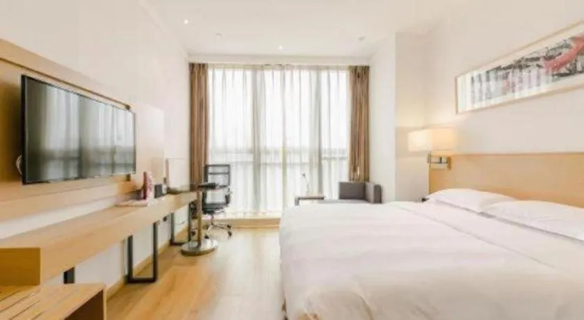 Bed in Ramada Encore by Wyndham Chongqing Yubei