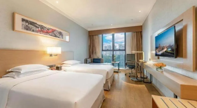 Bed in Ramada Encore by Wyndham Chongqing Yubei