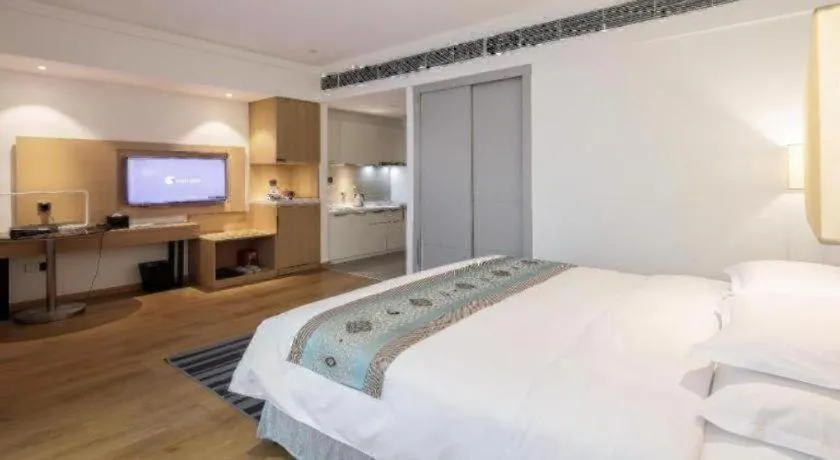 Bed in Ramada Encore by Wyndham Chongqing Yubei