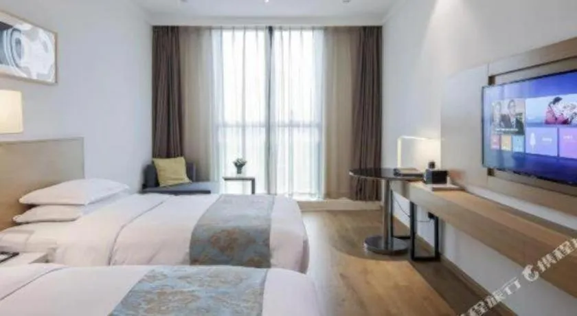 Bed in Ramada Encore by Wyndham Chongqing Yubei