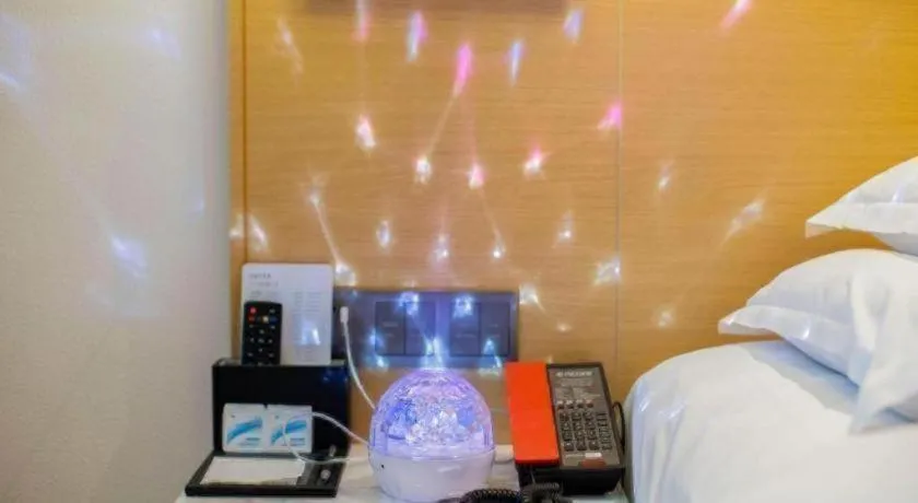 Bed in Ramada Encore by Wyndham Chongqing Yubei