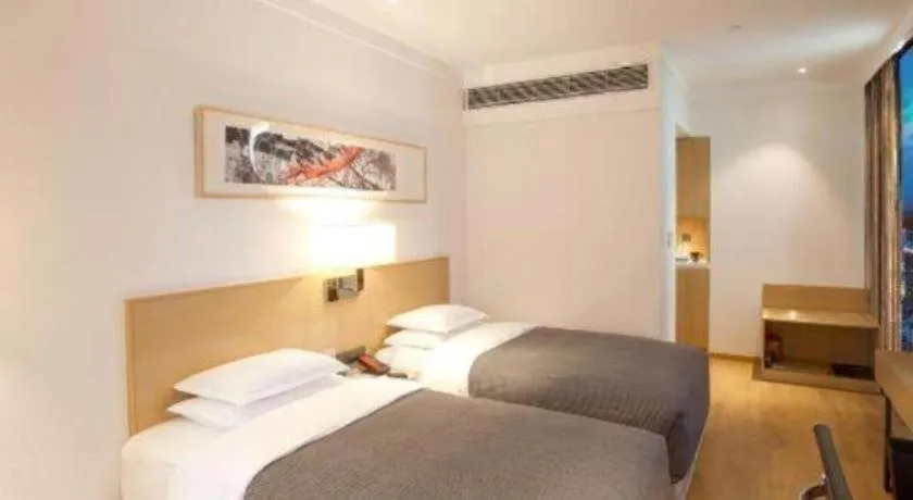 Bed in Ramada Encore by Wyndham Chongqing Yubei