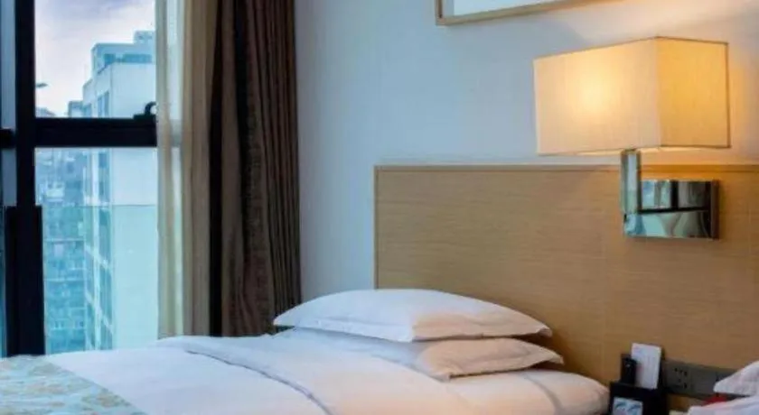 Bed in Ramada Encore by Wyndham Chongqing Yubei