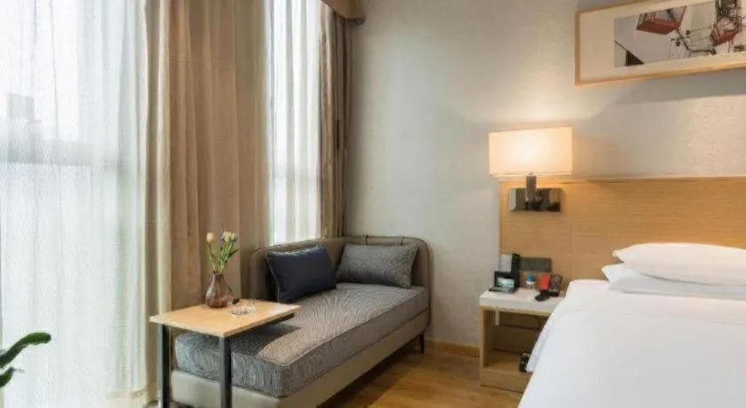 Bed in Ramada Encore by Wyndham Chongqing Yubei