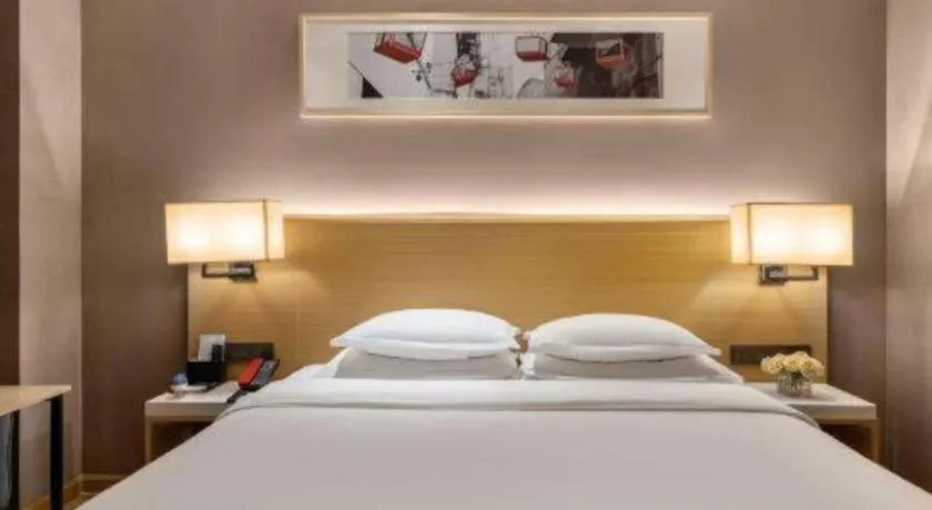 Bed in Ramada Encore by Wyndham Chongqing Yubei