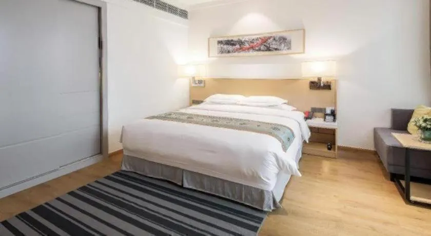 Bed in Ramada Encore by Wyndham Chongqing Yubei