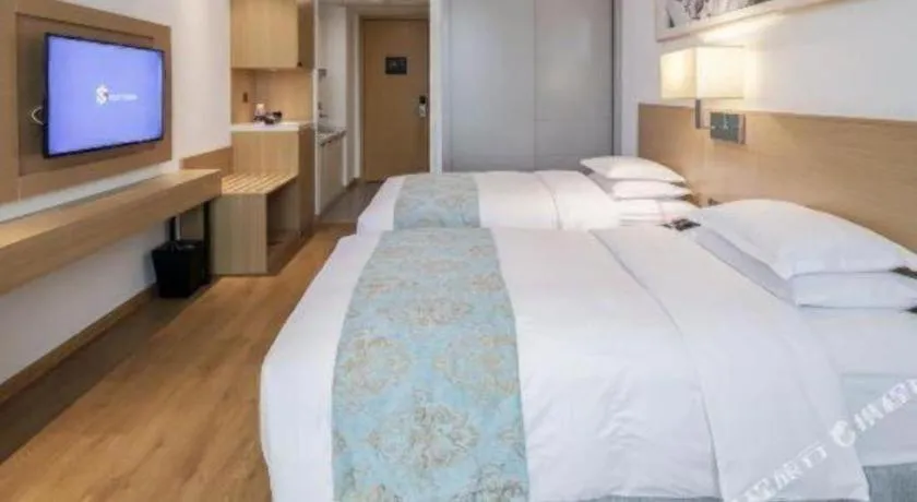 Bed in Ramada Encore by Wyndham Chongqing Yubei