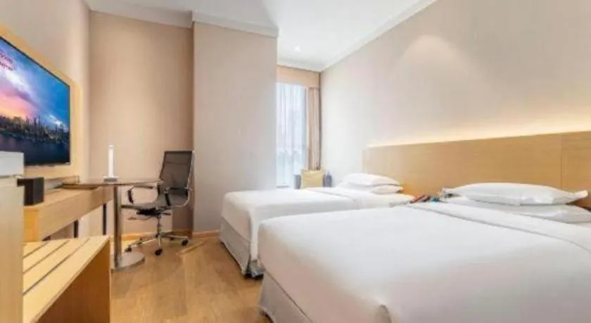 Bed in Ramada Encore by Wyndham Chongqing Yubei