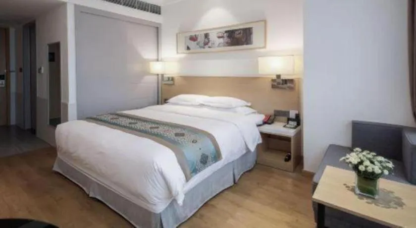 Bed in Ramada Encore by Wyndham Chongqing Yubei