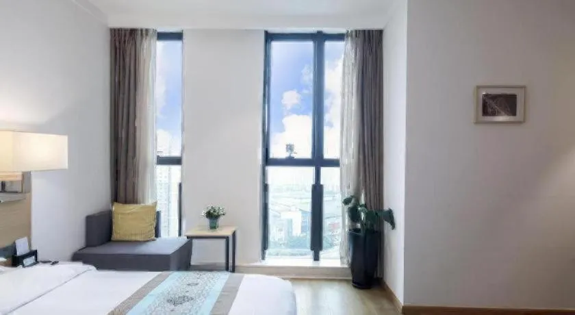 Bed in Ramada Encore by Wyndham Chongqing Yubei