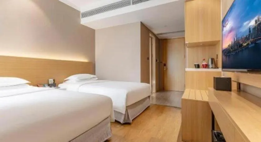 Bed in Ramada Encore by Wyndham Chongqing Yubei