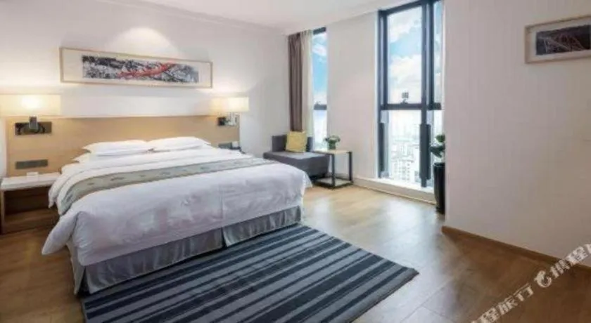 Bed in Ramada Encore by Wyndham Chongqing Yubei