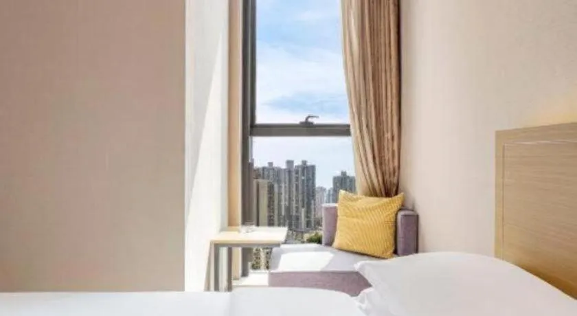 Bed in Ramada Encore by Wyndham Chongqing Yubei