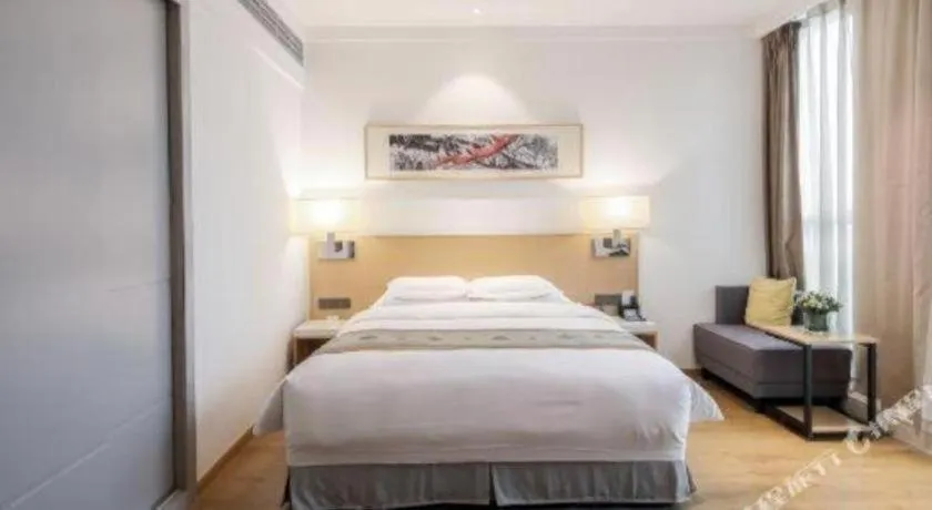 Bed in Ramada Encore by Wyndham Chongqing Yubei