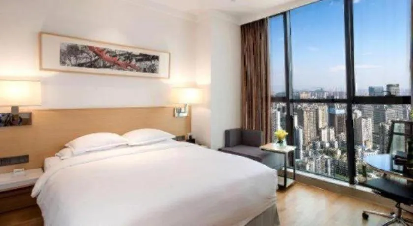 Bed in Ramada Encore by Wyndham Chongqing Yubei