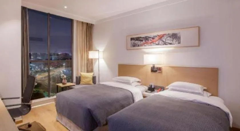 Bed in Ramada Encore by Wyndham Chongqing Yubei