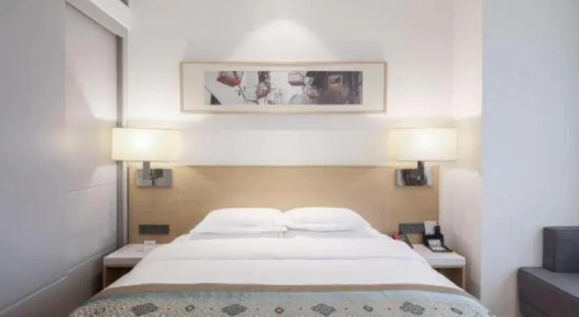 Bed in Ramada Encore by Wyndham Chongqing Yubei