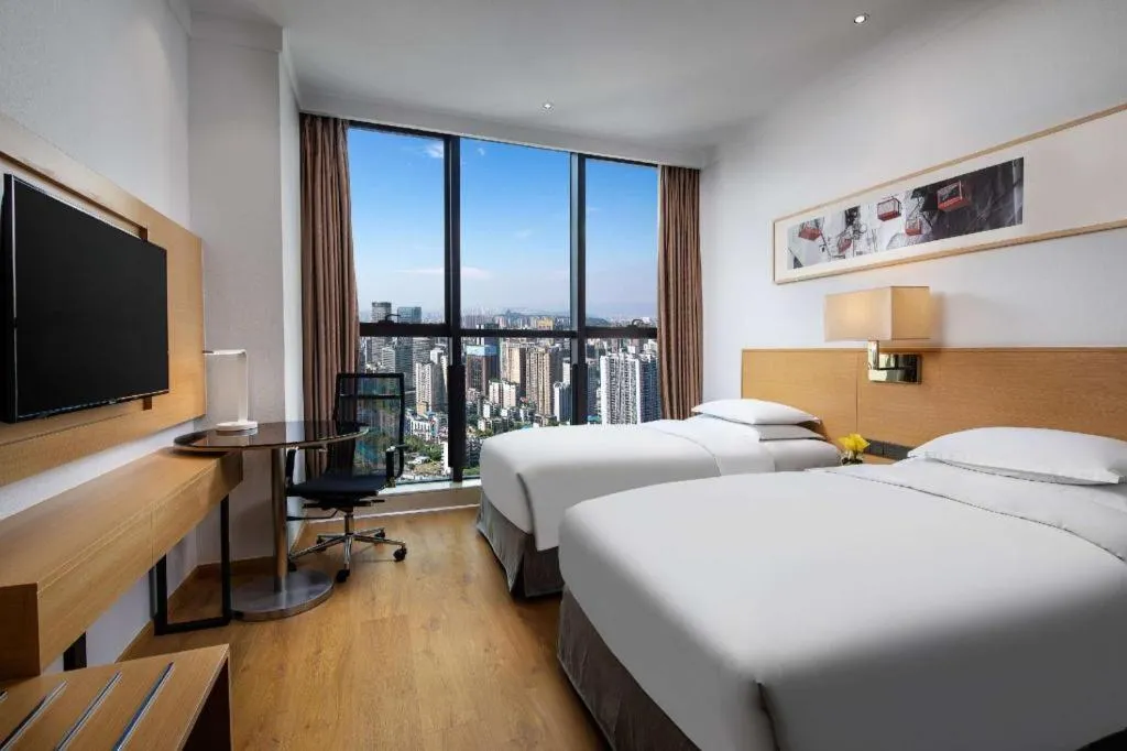 Bed in Ramada Encore by Wyndham Chongqing Yubei