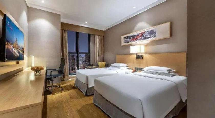 Bed in Ramada Encore by Wyndham Chongqing Yubei