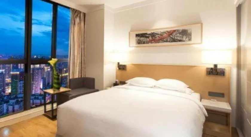 Bed in Ramada Encore by Wyndham Chongqing Yubei